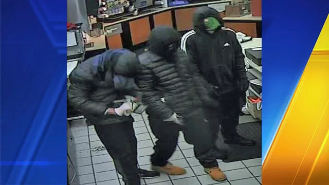 Image of trio of armed robbers hit Kent convenience store